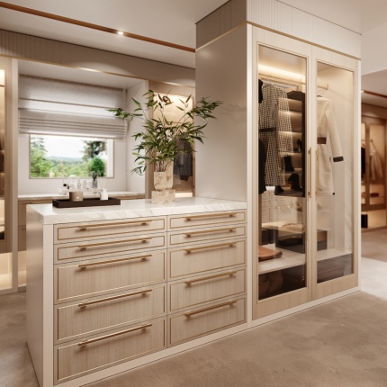Custom Blossom Closet with walnut veneer, LED-lit shelving, and brass handles by Lapa Interior Design